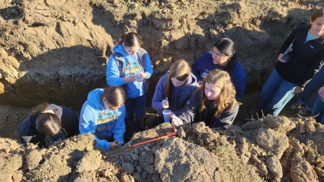 GLIDE — FFA members from around the district gathered at French Creek Ranch on Oct. 7 to compete at the first competition of the year: district soils.

Both Sutherlin’s advanced and beginning teams placed first.

At this competition, FFA members are able to go to three soil pits and use their knowledge to identify different soil characteristics. Students grab samples from the four soil horizons in order to identify features such as texture, color or the presence of mottles.

They can also go into the pit to observe soil structure or figure out if there are any special features.

From there, students answer a variety of questions based on their observations. This includes determining the erosion hazard, challenges with irrigation or drainability, as well as what crops are best suited to grow at that location.

https://www.nrtoday.com/news/education/ffa-digs-for-success-at-district-soils/article_0df8c734-291a-4860-8526-6cf2663f86a7.html