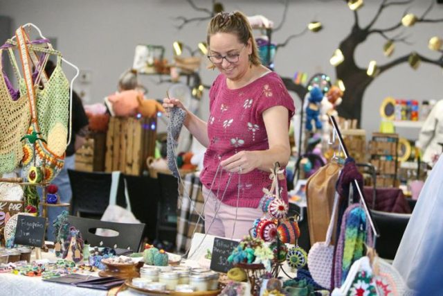 Jennie Gohman said vending at the Roseburg Senior Center Holiday Fair on Saturday was only her second time selling her products in such a way.

"I got to keep my hands busy. And so yeah, I kind of go from one media to the next, like I got on a stress ball kick because I was stressed out a lot, so then I made these (crocheted stress balls) and then I gave them to my kids, and then I gave them to people at the cancer center too," Gohman said.

At her booth Saturday, Gohman stood crocheting the beginning of a purse with various shades of grey. Her table included various crocheted items: stress balls, cacti in tiny pots, blankets, purses, bracelets and other odds and ends. Outside of crocheted items, Gohman served samples of her figapeno jam, with jars available for purchase, and some tallow balm.

For More Information Visit www.nrtoday.com