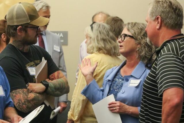 On Tuesday evening, The City of Roseburg finally unveiled its six city manager candidates in an open house event, the first step in its interviewing process to hire an official for the position. 

The position was left vacant at the end of June when former City Manager Nikki Messenger retired after more than 30 years with the city. To fill the vacancy, Roseburg Police Department Chief Gary Klopfenstein was appointed as City Manager pro-tem.

During the open house, candidates connected with city staff and Roseburg residents. They were each given 10-minute slots to introduce themselves to the crowd, sharing details on their background, work mentality and goals.

"We want somebody who can relate to the council, can relate to citizens, can relate to staff (and) can stay focused on doing what's best and right for Roseburg," Roseburg Mayor Larry Rich said. "We need somebody who has the communication skills and desire to really shine and do their best."

Across the week, a series of candidate interviews will take place between three panels: One consisting of the Roseburg City Council, another made up of city staff and a third of community members put forth by the council.

For More Information Please Visit www.nrtoday.com