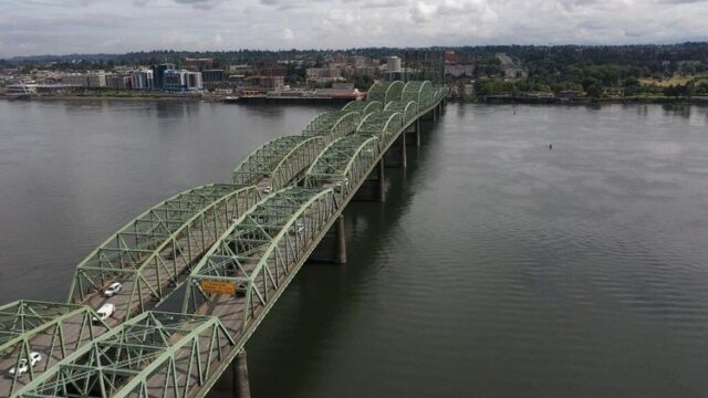 Traffic on the new bridge will plummet from current levels, and even with the higher tolls, there’s a major funding gap.

A yet-to-be-released analysis of the proposed new Interstate Bridge provides the clearest view yet of how tolling, which is central to any effort to fund and build the public works project across the Columbia River, could affect traffic numbers—and the project’s funding shortfall.

It’s a matter of statewide importance for Oregonians, given that the interstate crossing is an economic artery not only for commuters but truck freight from Ontario to Ashland and every Oregon city and town in between.

Tolling Interstate 5 between the two states has long been a crucial element of the Interstate Bridge Replacement Program’s financial plan. The current study—an “investment grade analysis”—is the most rigorous look at how much cash tolling revenues would generate and therefore how much the bi-state project can borrow against those future revenues.

The $2.3 million analysis, conducted by the engineering firm Stantec, evaluated four different tolling scenarios. Although the analysis has not yet been completed, Portland economist Joe Cortright, a longtime critic of the bridge replacement project, obtained some of the key aspects of Stantec’s work through a public records request. He shared the documents with OJP.

The documents show that traffic across the bridge will drop dramatically when tolling begins. The study’s calculations show that crossings over a tolled bridge could plunge by 50,000 vehicles—more than one-third of the 134,000 cars that officials say cross the I-5 bridge today.

For More Information Please Visit www.nrtoday.com