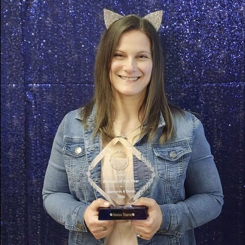 Each year, the Myrtle Creek–Tri City Area Chamber of Commerce recognizes citizens and institutions which represent the best the region has to offer with the Myrtle Creek Citizens of the Year Banquet. Last weekend, a new group of citizens got their time to shine.

The 2026 Myrtle Creek Citizens of the Year Banquet was held Saturday, inviting the community to witness the award ceremony for citizens both actively involved in community betterment and those who are dearly departed.

Two citizens were surprised with Woman of the Year and Man of the Year awards: Jessica Sharon and Jason Mann, respectively.

Sharon is the co-owner of both The Regal Raptor Thrift Store, a thrift and consignment shop, and The Vault Entertainment Center arcade. She is a board member in both the chamber of commerce and Main Street Myrtle Creek Association.

Recently, Sharon was instrumental in forming the Myrtle Creek Mural Committee, a group focused on pursuing beautification and mural opportunities for the city. She said the Woman of the Year honor is just the start of her ongoing community activity.

"I love Myrtle Creek and the community so much and I just try to put work in every single day to make it a better place to live," Sharon said. "I just want to keep pushing for more, so it's incredible that I'm seeing the community appreciate that."

Mann is the owner of J Mann Realty, a real estate company, and president of the Main Street Myrtle Creek Association.

Through his business, he helps organize the annual Let's Scramble for Scholars Golf Tournament, an annual golf fundraiser which he said has raised $24,000 in proceeds for Douglas County student over the last two years.

For More Information Please Visit www.nrtoday.com