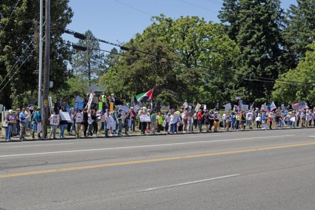 On June 14, 2025, Roseburg participated in one of the largest nationwide demonstrations in modern American history with the "No Kings Day" protest. According to Indivisible Douglas County (IDC), the event brought out millions of protesters across the world, and over 2,000 in Roseburg alone.
Now, that demonstration is coming back to the area with "No Kings Day 2.0 " this Saturday in Roseburg. According to an IDC press release, the message behind the protest is "demanding an end to the authoritarianism of the Trump administration" and to "defend democratic rights in the United States."
According to IDC group leader Lupe Preciado-McAlister, the event will function just as it did before, with protestors lining sidewalks to wave banners and fliers at passing traffic.
However, she said she anticipates the protest to be larger, with at least twice as many attendees as the previous "No Kings Day."
https://www.nrtoday.com/news/thousands-in-douglas-county-attended-the-no-kings-day-protest-now-another-is-on-the/article_9b1e2ebb-2686-498c-8ca6-49b27449088c.html
