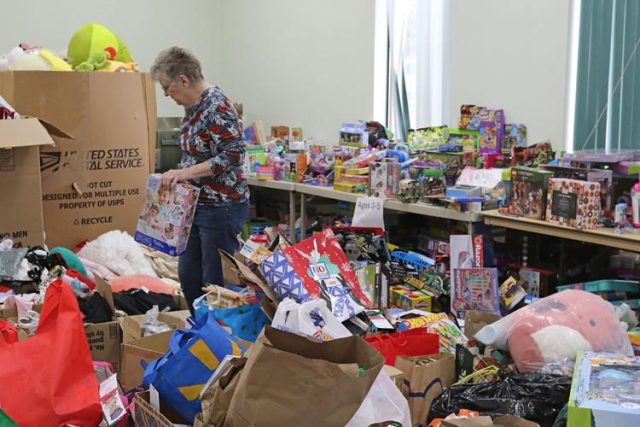 As Anne Silva filled boxes with gifts for children, a smile spread across her face, she reflected on why she's done so much with The Salvation Army (TSA) for the past eight years, waking up early every day to get the work done in time for Christmas.

"It's just a blessing to do this," Silva said. "We're committed to this ... I used to say we need a cot in the back room, because we're back here every morning."

Silva is one of many volunteers assisting The Salvation Army Roseburg Corps for its Angel Tree program, an annual holiday charity event where locals donate food, clothing, toys, blankets, tools and more for families in need.

According to the Roseburg Corps website, the program typically provides for over 140 children a year. TSA Family Service and Program Assistant Katrina Basso said the community has been especially generous this year, with initial signups completed by mid-November.

By the end of the holiday season, 200 families are expected to receive food this year, with 458 children receiving toys through the program.

For More Information Please Visit www.nrtoday.com